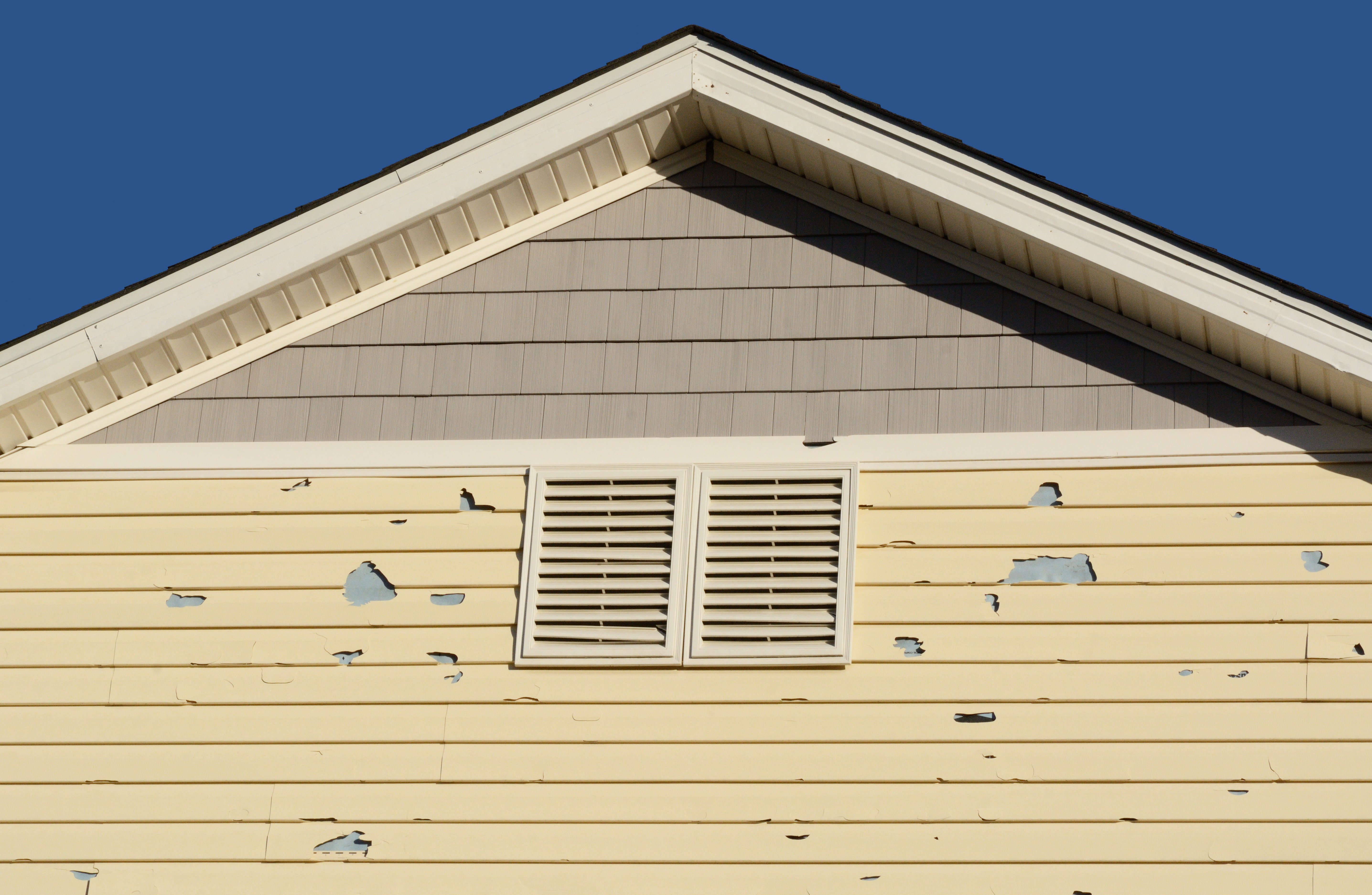 Adobe Stock - Hail Damage Siding